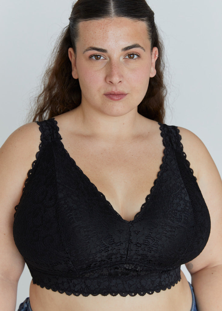 Front portrait view of the black Kimi lace bra for large breasts, showing the elegant lace neckline and secure wire-free support