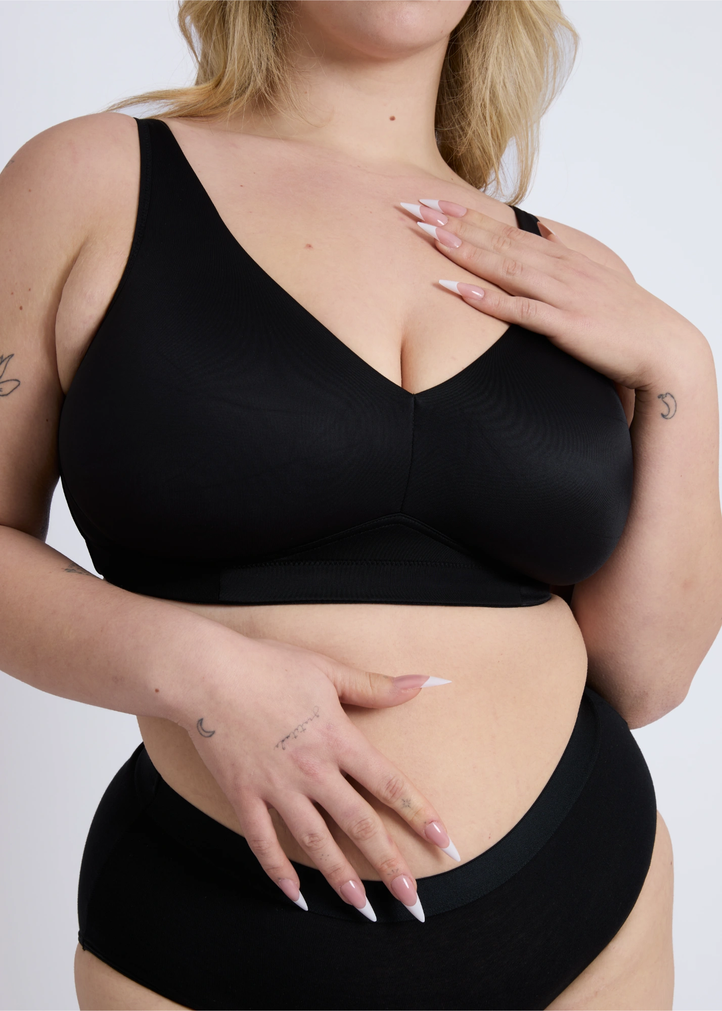 Close-up front view of the Doni black wireless bra by NewG, designed for comfortable support and a seamless fit for large busts.