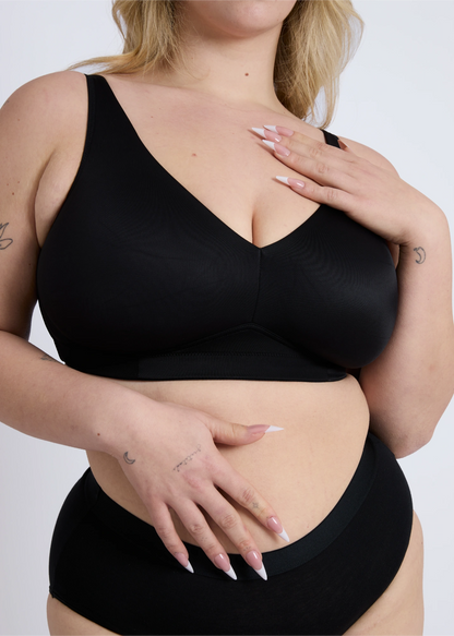 Close-up front view of the Doni black wireless bra by NewG, designed for comfortable support and a seamless fit for large busts.