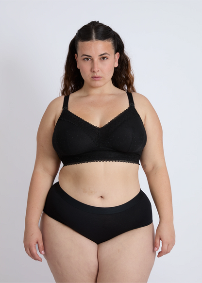 Front view of a black open-back nursing bra for large bust providing support and style
