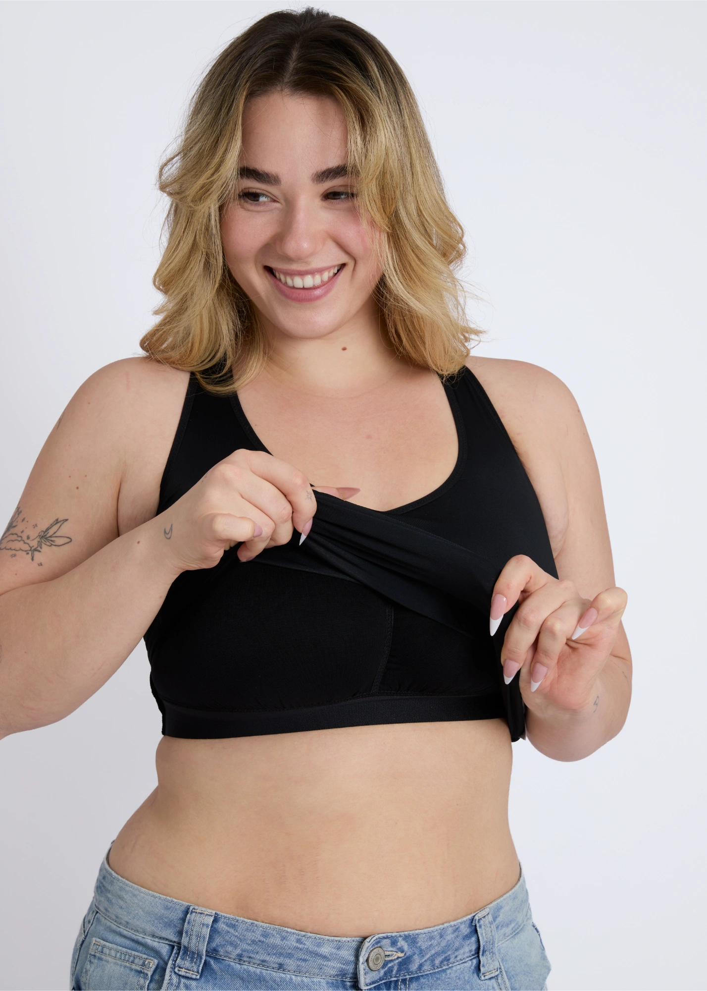 Close-up of the high-quality black fabric on a supportive tank top for large breasts with a built-in bra