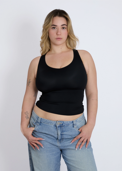 Front view of a black supportive tank top for large breasts with a built-in shelf bra for everyday comfort