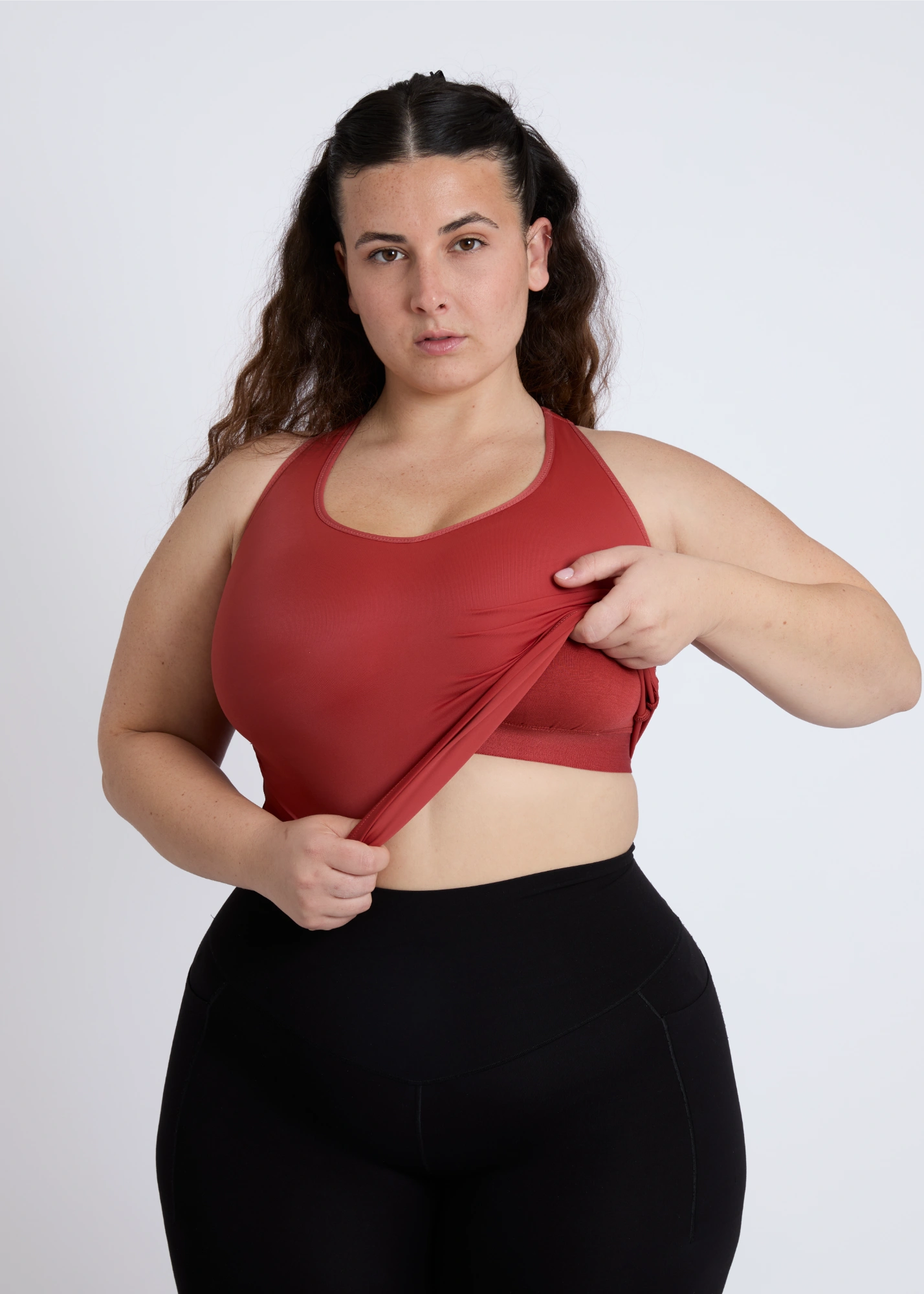Close-up view of a supportive tank top for large breasts showing the high-quality fabric and built-in bra structure
